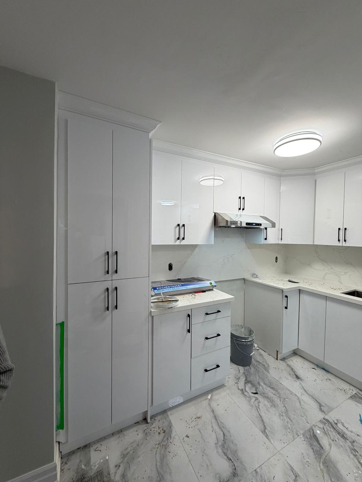 White glossy cabinet installation